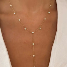 Lariat Diamonds necklace worn by a person