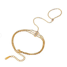 gold triple chain bracelet
