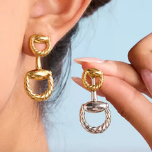 Gold stud and drop earrings
